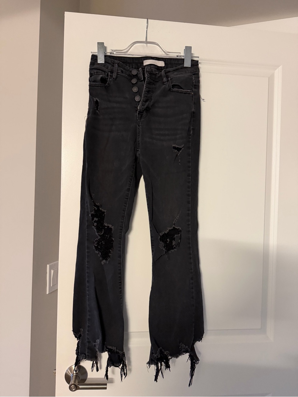 High-Rise Black Distressed Flare Jeans